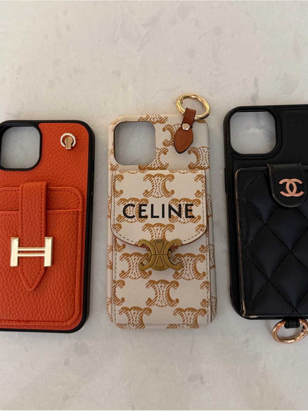 Black Quilted Leather Phone Case with Gold Hardware white and gold case as well